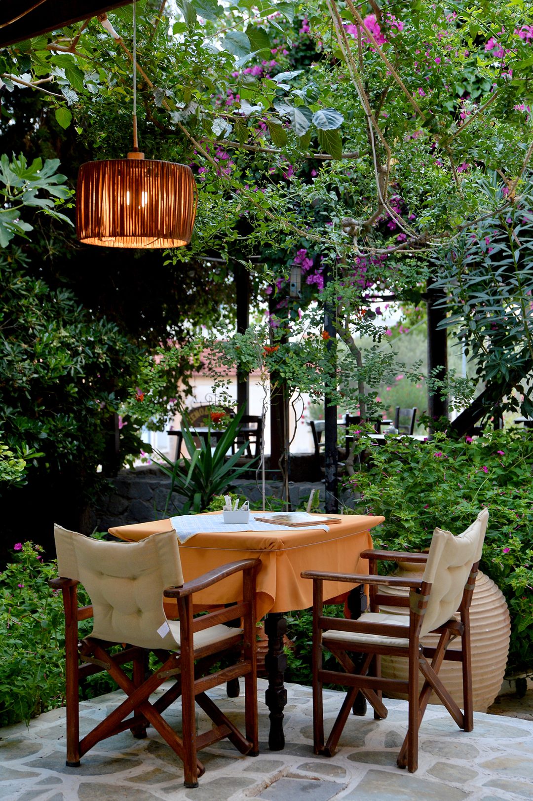 Outdoor dining area with tables and chairs